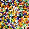 Vibrant collection of multicolored craft beads for creative projects and artistic designs.